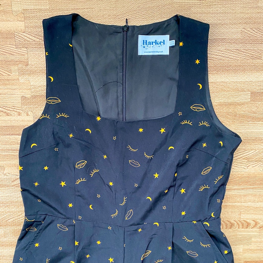 Harkel black jumpsuit with yellow design